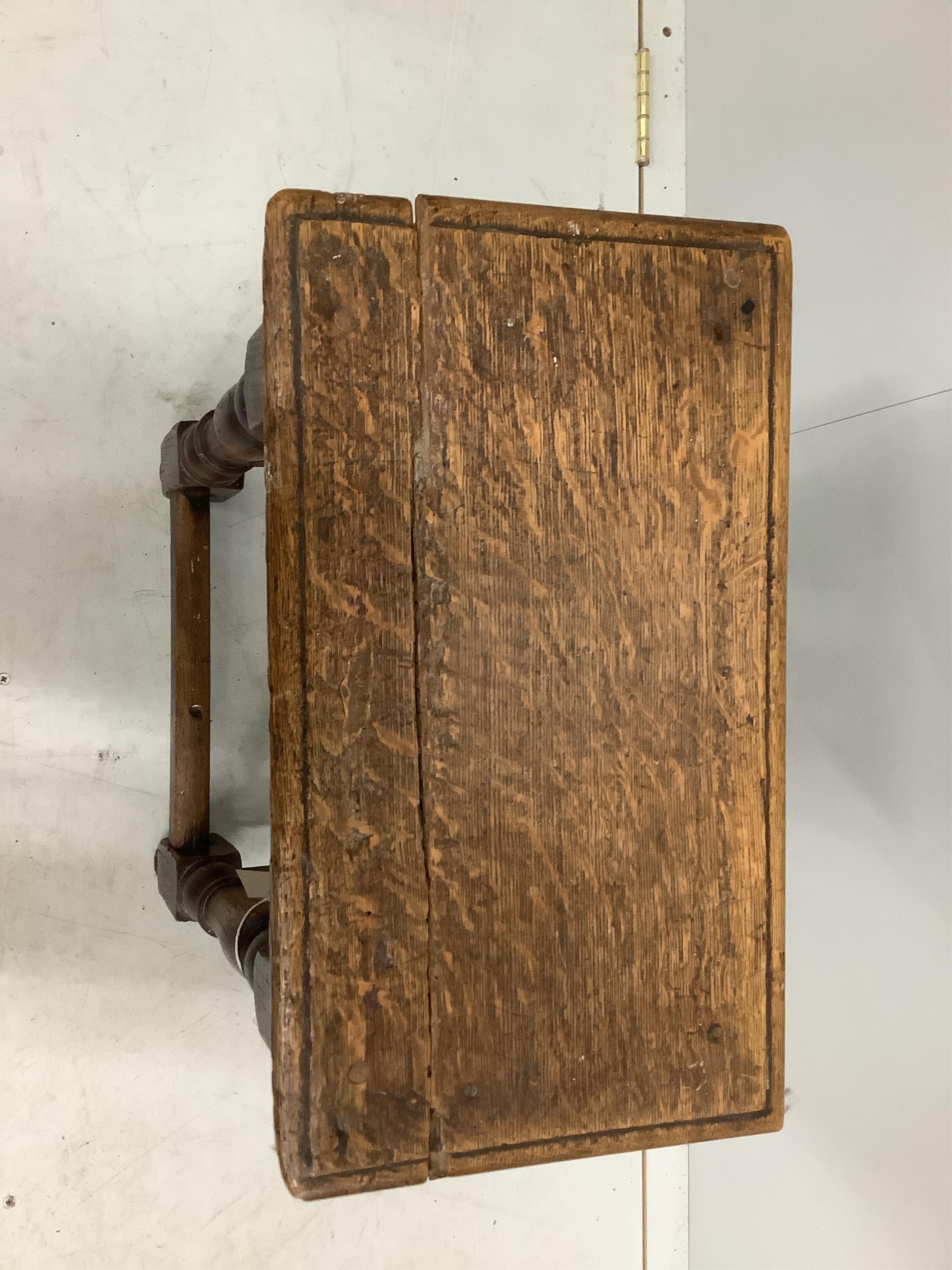 An 18th century style oak joint stool, width 44cm, depth 25cm, height 53cm